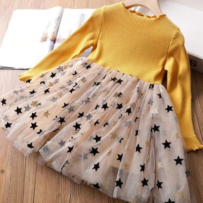 Adorable toddler girls' long sleeve star mesh party dress in vibrant red.
