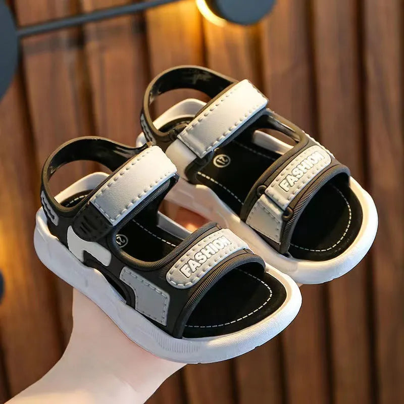 Red non-slip beach sandals for children with hook and loop closure, lightweight & quick-dry.