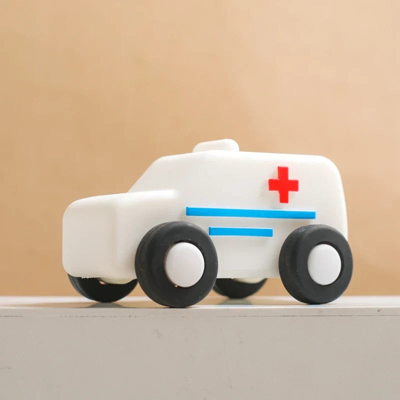 Collection of unisex silicone vehicle teethers in various colors and shapes