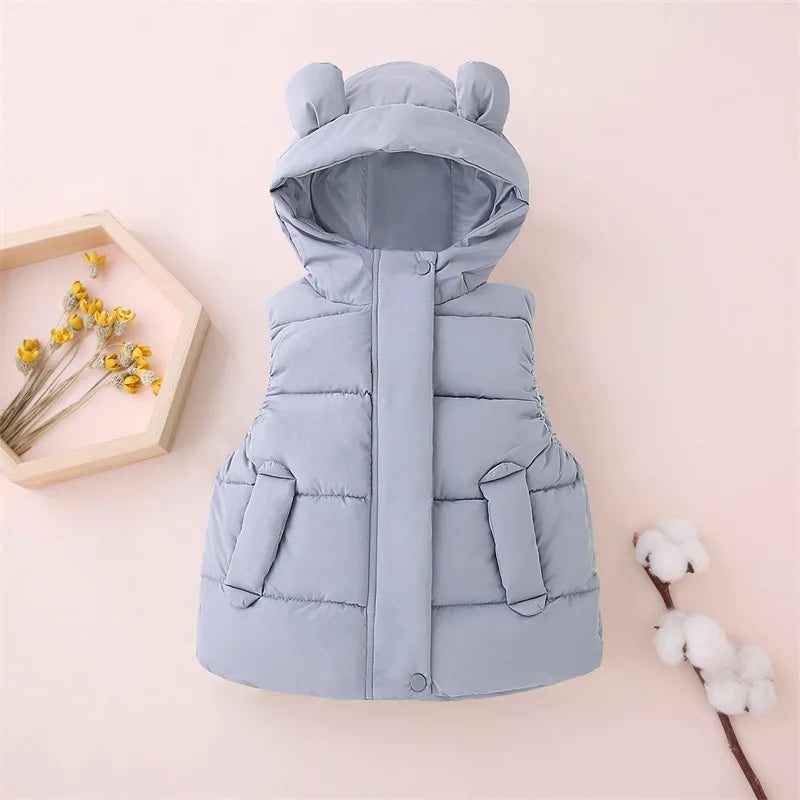 Yellow toddler hooded puffer vest, stylish outerwear, great for active kids.