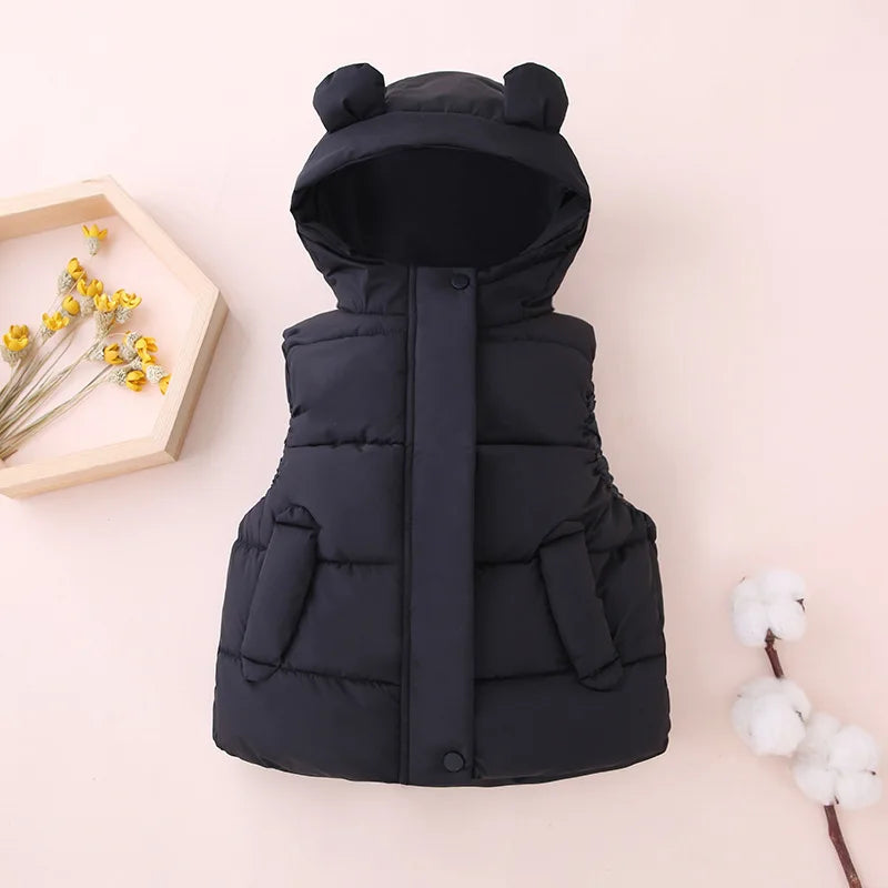 Orange toddler hooded puffer vest, bright children's fashion, comfortable & soft.
