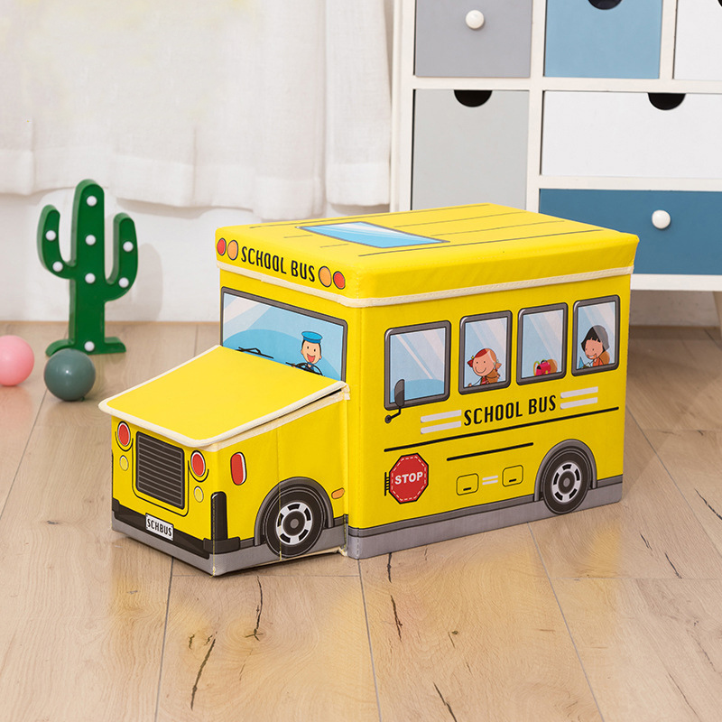 Blue toy box with seat, designed as a playful bus for children's toy organization and seating.