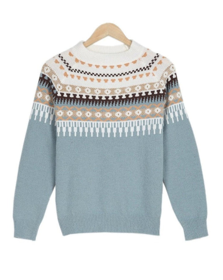 Women's warm knit long-sleeve sweater, relaxed fit for cozy fall and winter everyday wear.