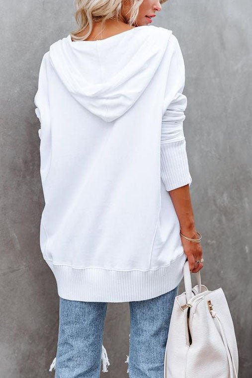 Effortless women's longline pullover sweatshirt, relaxed fit tunic hoodie for casual fashion.