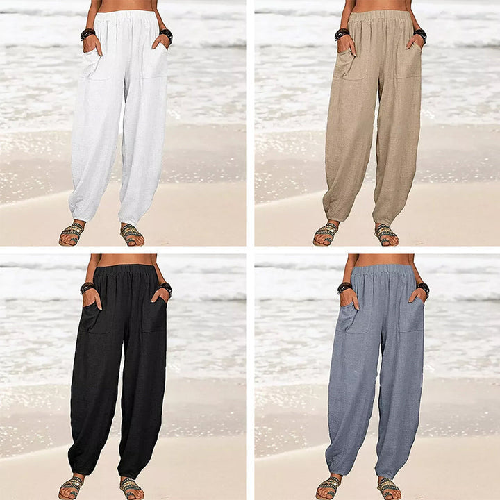 Elegant women's relaxed wide-leg pants with elastic waist, designed for comfortable summer beach and resort wear.