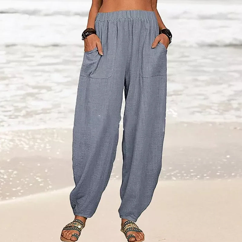 Close-up of soft, breathable fabric of women's relaxed fit flowy pants, essential for summer comfort.