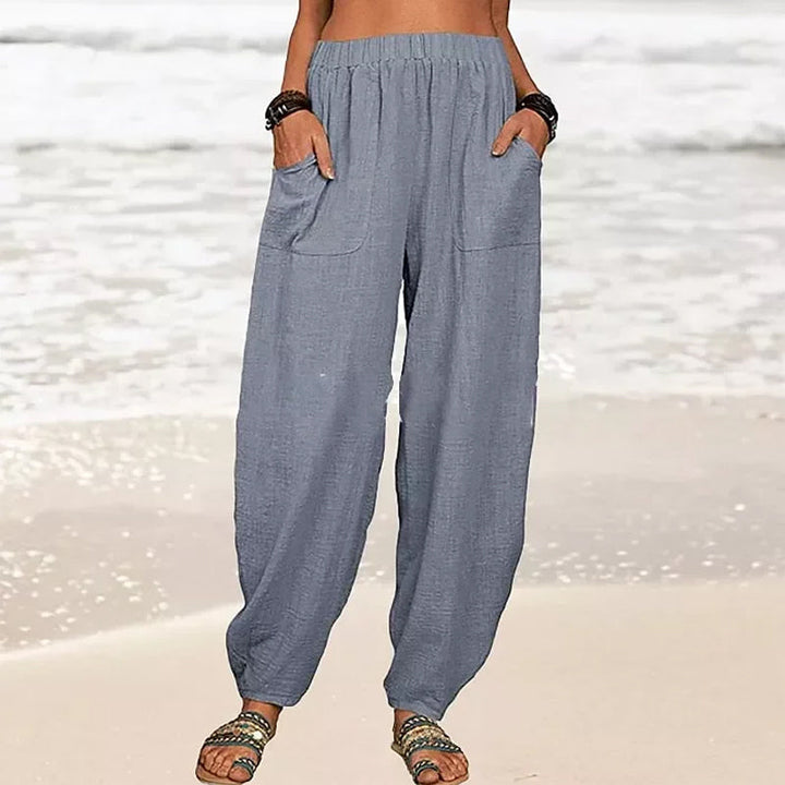 Close-up of soft, breathable fabric of women's relaxed fit flowy pants, essential for summer comfort.