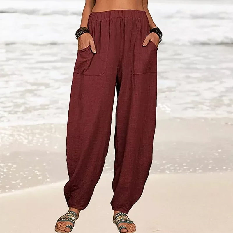 Blue relaxed fit wide-leg pants for women, featuring a comfortable elastic waist, great for summer fashion.