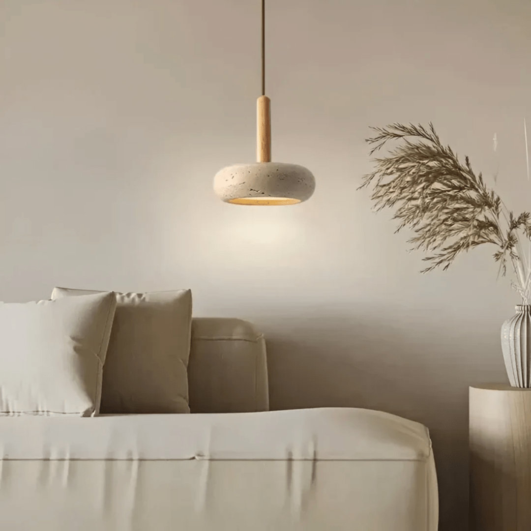 Close-up of a retro LED ceiling light showing its natural wood grain and subtle stone texture.