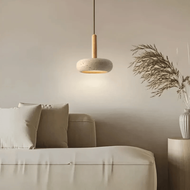 Close-up of a retro LED ceiling light showing its natural wood grain and subtle stone texture.