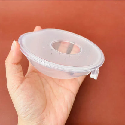 Nursing mom wearing a silica gel milk collector, showing its discreet fit