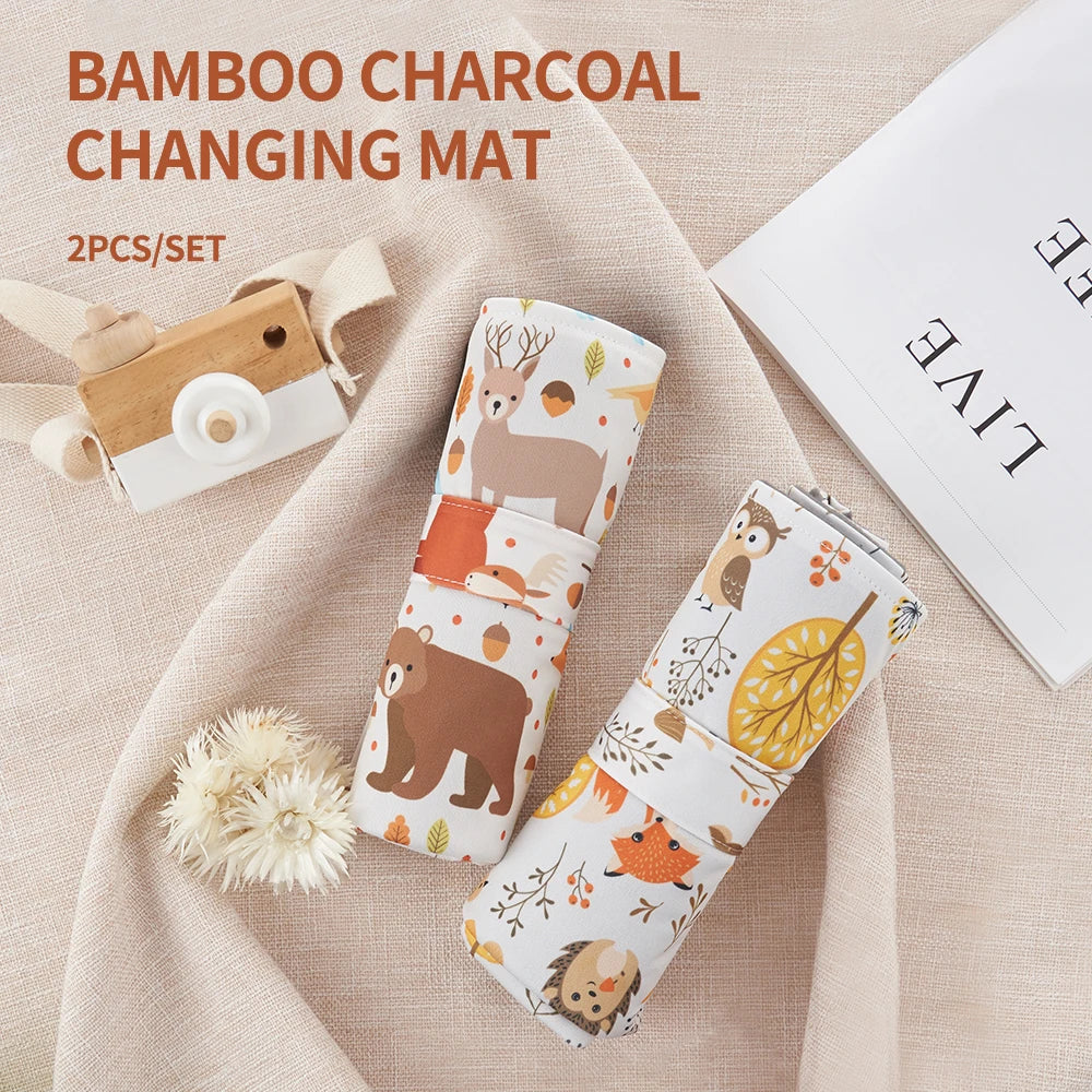 Two-piece gray bamboo charcoal diaper changing mat set for babies, portable and soft.
