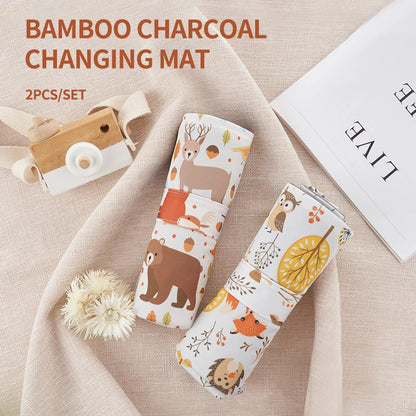 Two-piece gray bamboo charcoal diaper changing mat set for babies, portable and soft.