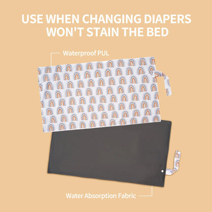 Foldable baby changing mat made of bamboo charcoal, designed for easy travel and hygiene.
