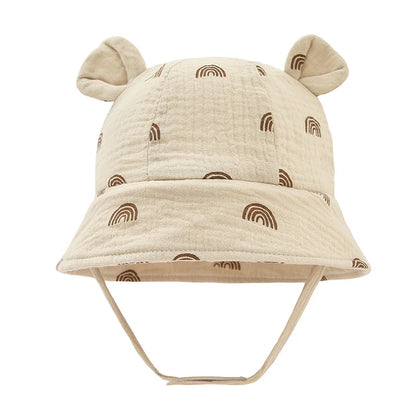 Infant cotton bucket hat, reversible, white tiger print, perfect for summer sun protection.