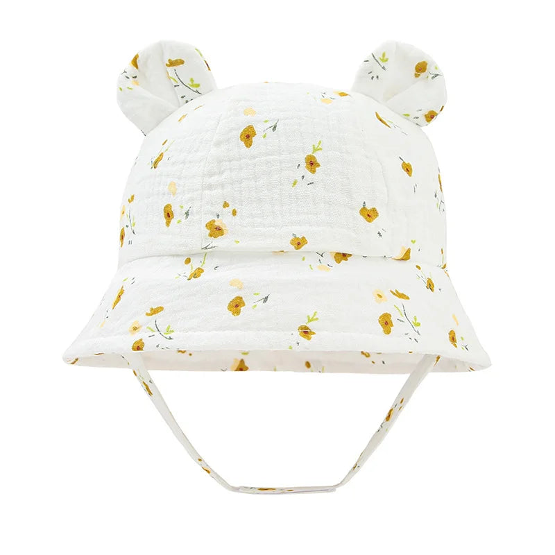 Soft cotton baby bucket hat, reversible with flower print, excellent for sun protection.
