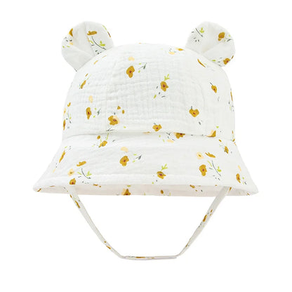 Soft cotton baby bucket hat, reversible with flower print, excellent for sun protection.