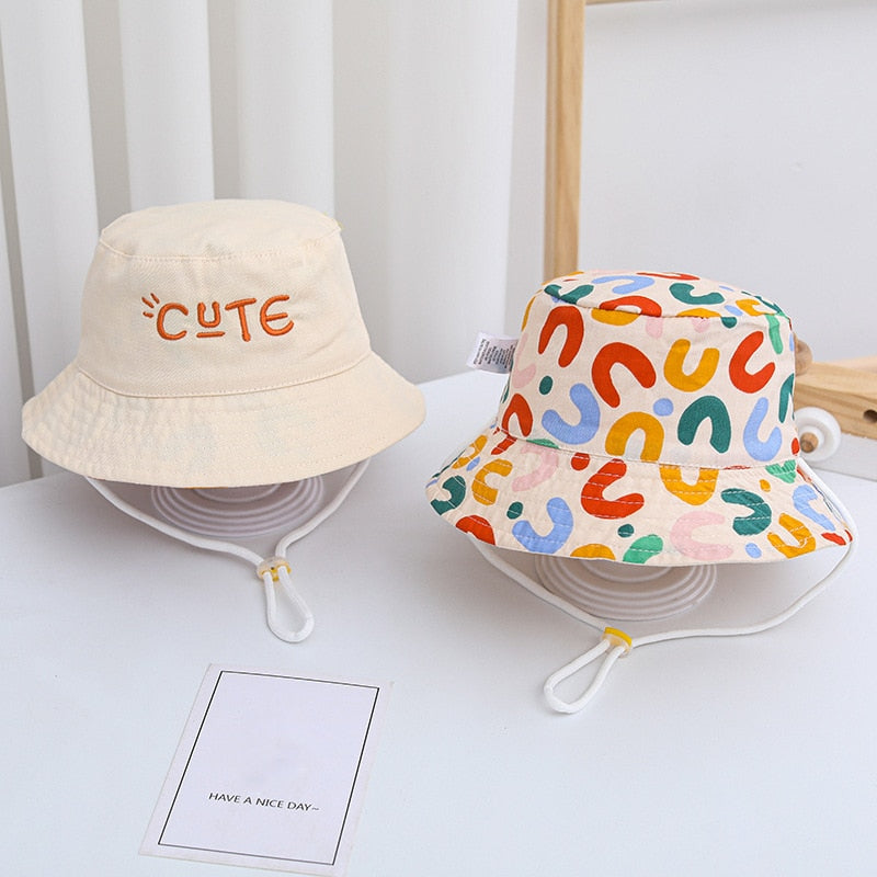 Reversible cotton baby sun hat with wide brim, perfect for summer outdoor protection