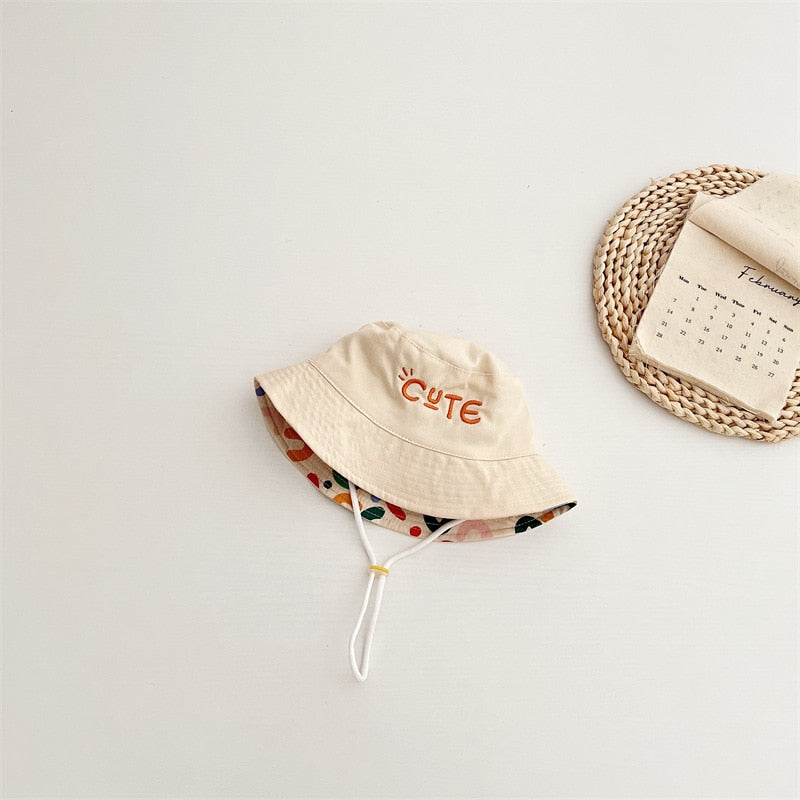 Soft cotton baby sun hat, reversible design with two patterns for infant and toddler sun protection
