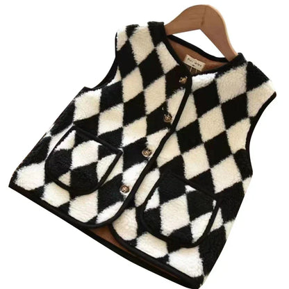 Toddler's reversible puffer vest, a versatile and warm piece of children's fall apparel.