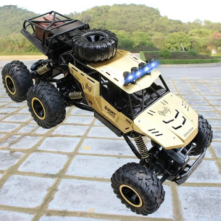 ROCKSTRIKER 6x6 RC monster truck with its large tires, perfect for off-road racing and play.