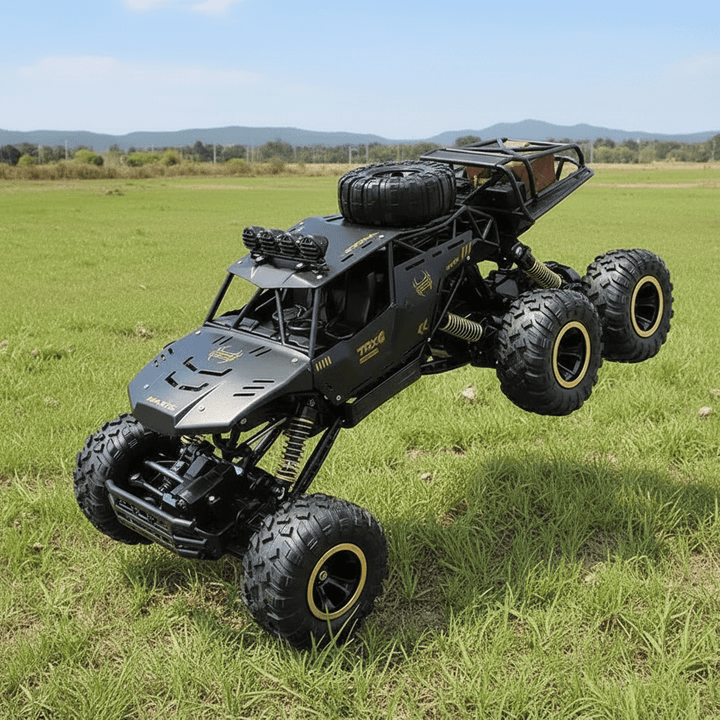 Action shot of a ROCKSTRIKER 6x6 RC truck driving through mud, proving its all-terrain prowess.
