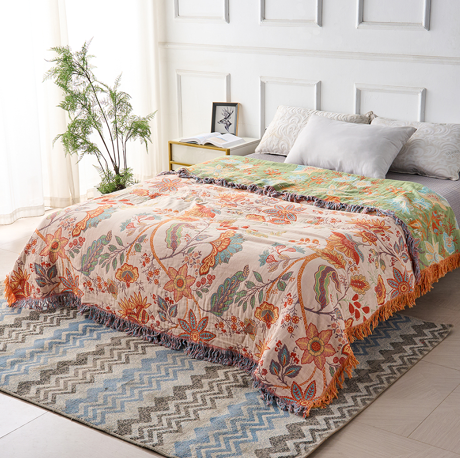 Soft, machine washable cotton blanket with a rustic floral boho design. Great home decor.
