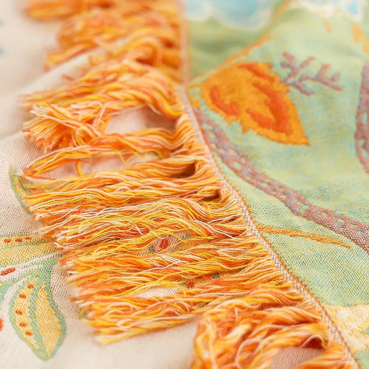 Intricate rustic floral pattern on a soft cotton boho blanket. Versatile home decor throw.