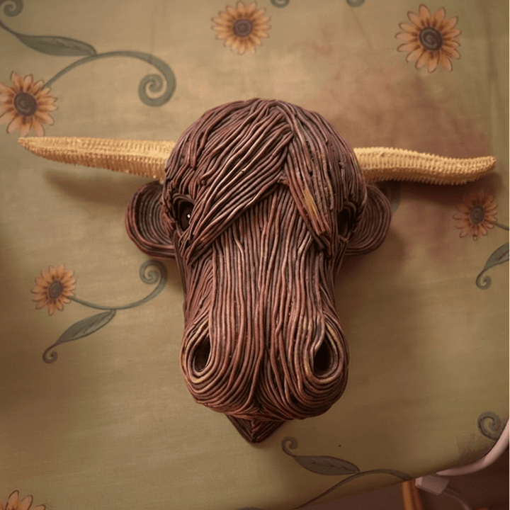 Handcrafted resin & metal Highland Cow sculpture, detailed animal wall art for rustic home decor.