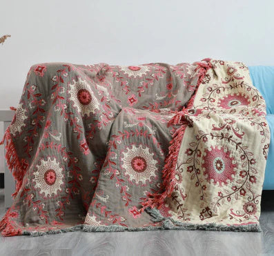 Versatile Scandinavian bird design cotton throw, ideal as a decorative blanket or picnic accent.