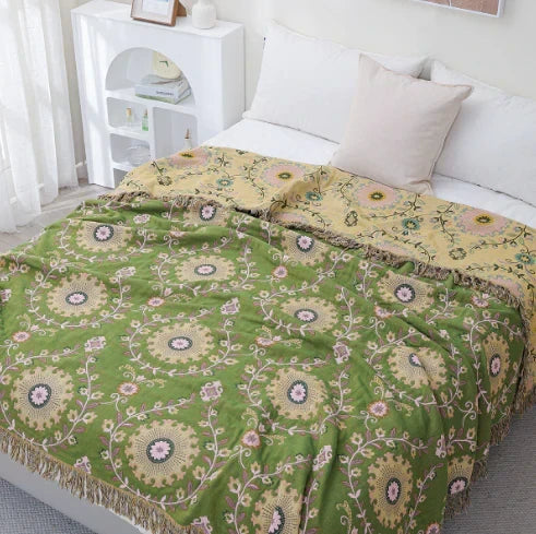 Accent your home with this Scandinavian bird pattern cotton throw blanket, great for living spaces.
