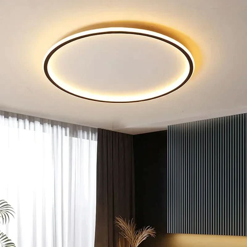 Scandinavian LED ceiling light. Modern minimalist design creates warm ambient lighting for living rooms & bedrooms.