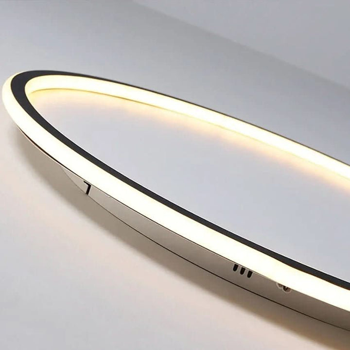 Elegant Scandinavian LED ceiling light illuminating a contemporary living room, a key modern home decor lighting fixture.