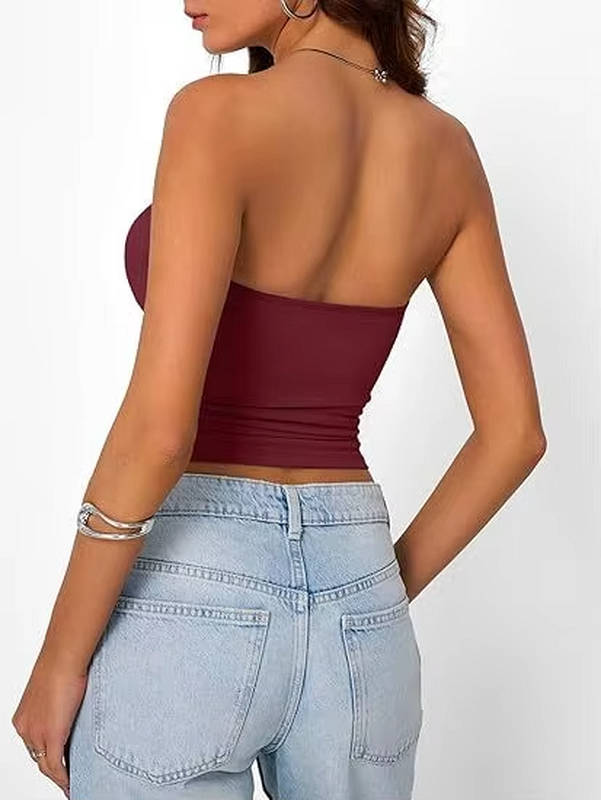 Seamless black bandeau crop top. Women's strapless stretch essential for summer chic.