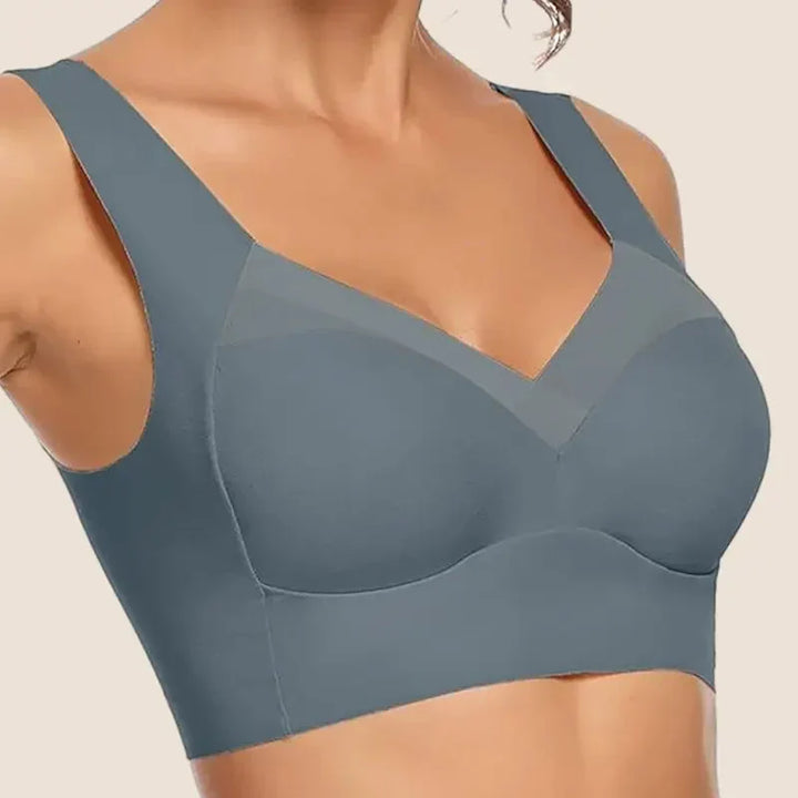 Nude women's seamless push-up comfort bra, wireless and smoothing for versatile wear.