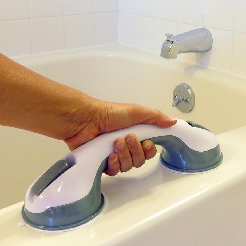 Portable non-slip grab bar for bath safety; suction cup design ideal for travel, temporary use or elderly care.