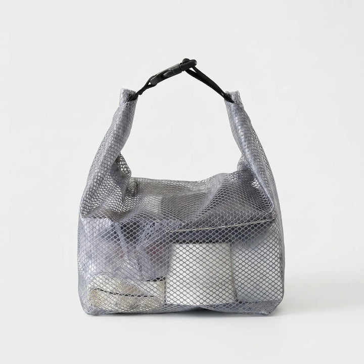 Effortless semi-transparent toiletry bag for travel. Water-resistant and clear design for easy content visibility.
