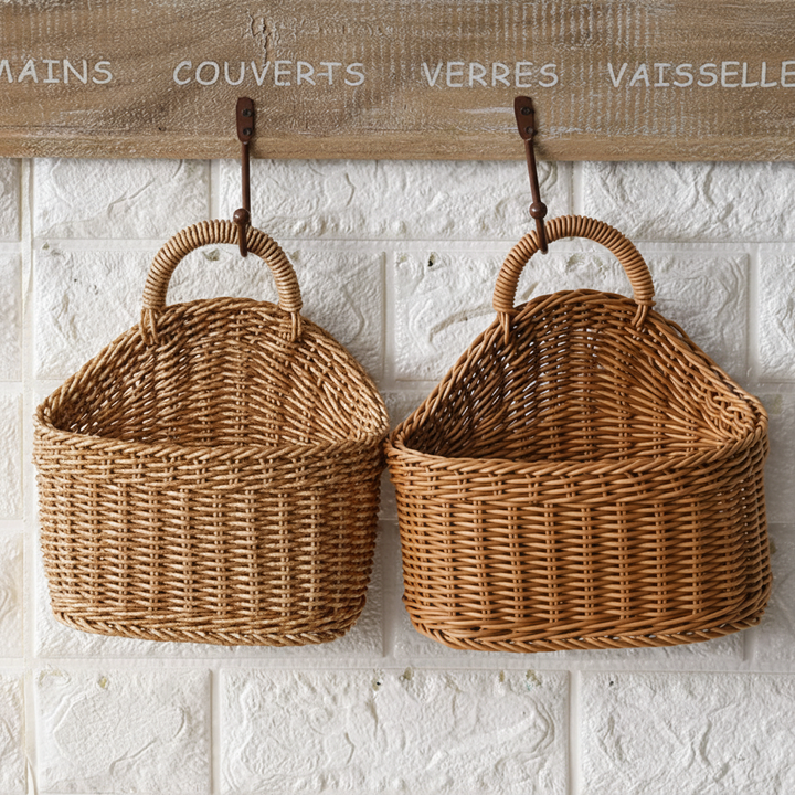 Decorative handmade woven wall baskets (set of 2) in natural fibers, ideal for rustic home decor & storage.