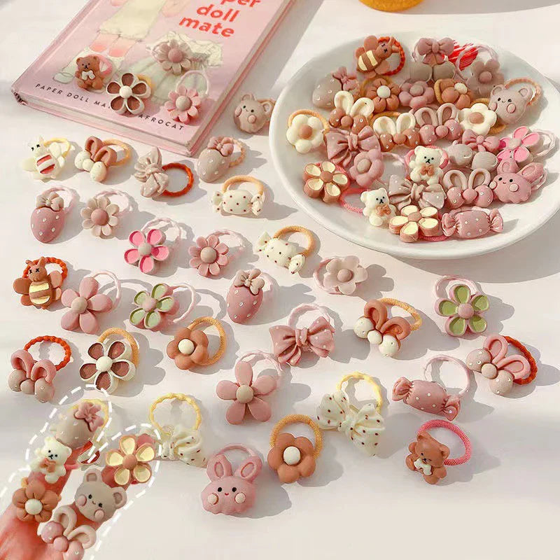 Kids' hair accessories: elastic hair bands featuring beloved cartoon characters, suitable for all hair types.