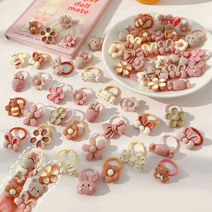 Kids' hair accessories: elastic hair bands featuring beloved cartoon characters, suitable for all hair types.