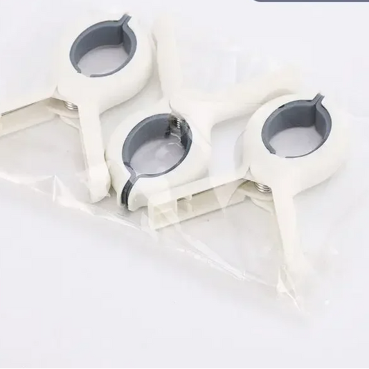 Set of 3 colorful baby stroller clips securing a blanket, ideal for pram, car seat, or travel safety