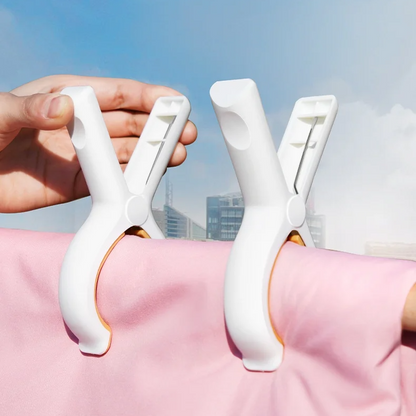 Baby accessories: a trio of colorful stroller clips, double as pram pegs or car seat blanket holders