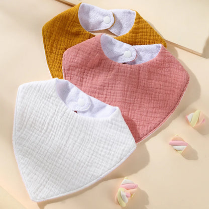 Set of 3 waterproof muslin cotton baby bibs, ideal for mess-free mealtime & feeding essentials.