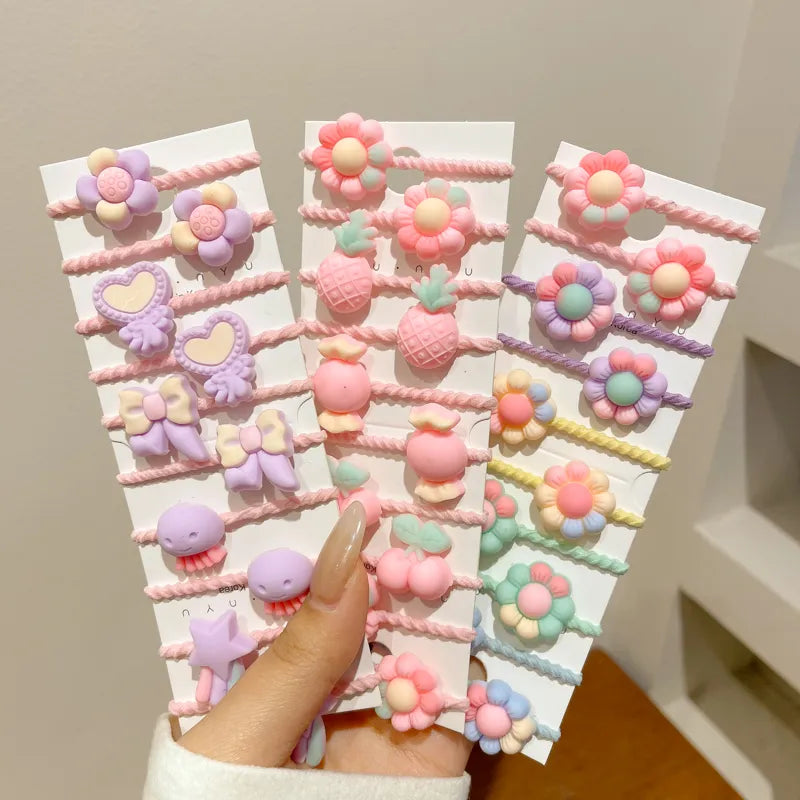 Brightly colored children's elastic hair bands with various cartoon figures, 50 pieces for daily use