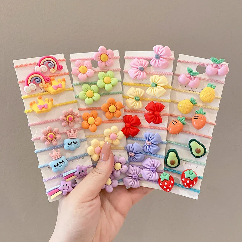 Close-up of a 'flower' shaped cartoon elastic hair band, excellent for styling young girls' hair