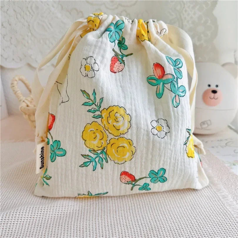 Natural cotton mommy bag, a versatile and soft storage solution for baby items.