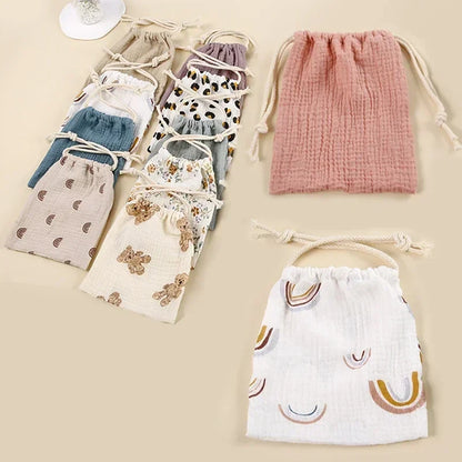 Mommy storage bag made from eco-friendly cotton, great for diapers and baby travel.