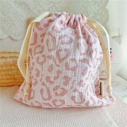 Stylish patterned cotton nursery storage bag, practical for baby accessories organization.