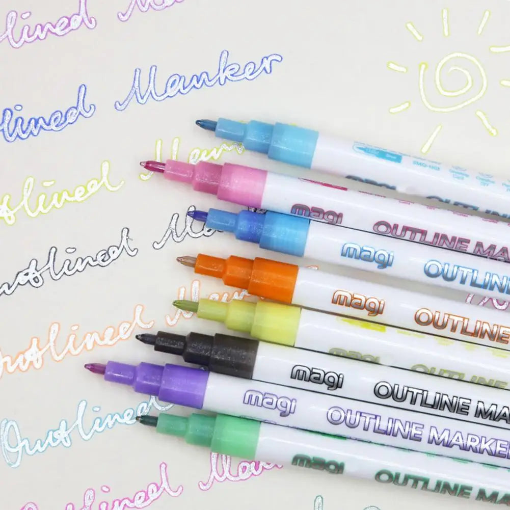 Fluorescent marker pens laid out on a table, showcasing a range of vivid colors for artists.
