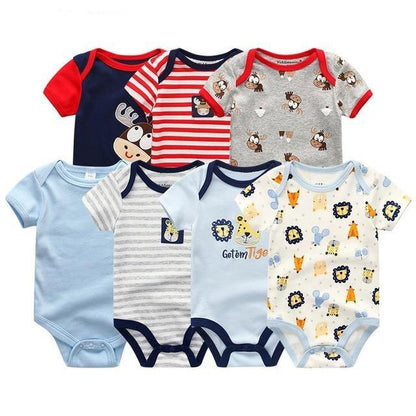 Essential baby gift set: 7 soft cotton rompers and jumpsuits for newborns and infants.